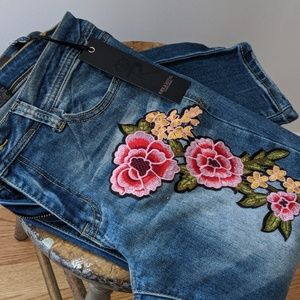 Embroidered skinny low rise jeans